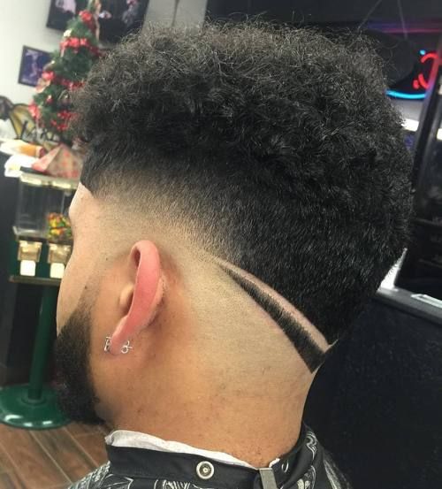 curly top taper fade with nape design