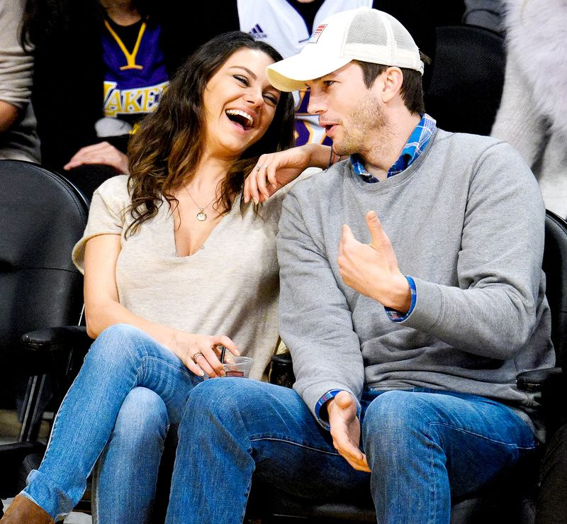 Mila Kunis und Ashton Kutcher besuchen ein Basketballspiel zwischen den Oklahoma City Thunder und den Los Angeles Lakers im Staples Center am 19. Dezember 2014 in Los Angeles, Kalifornien.