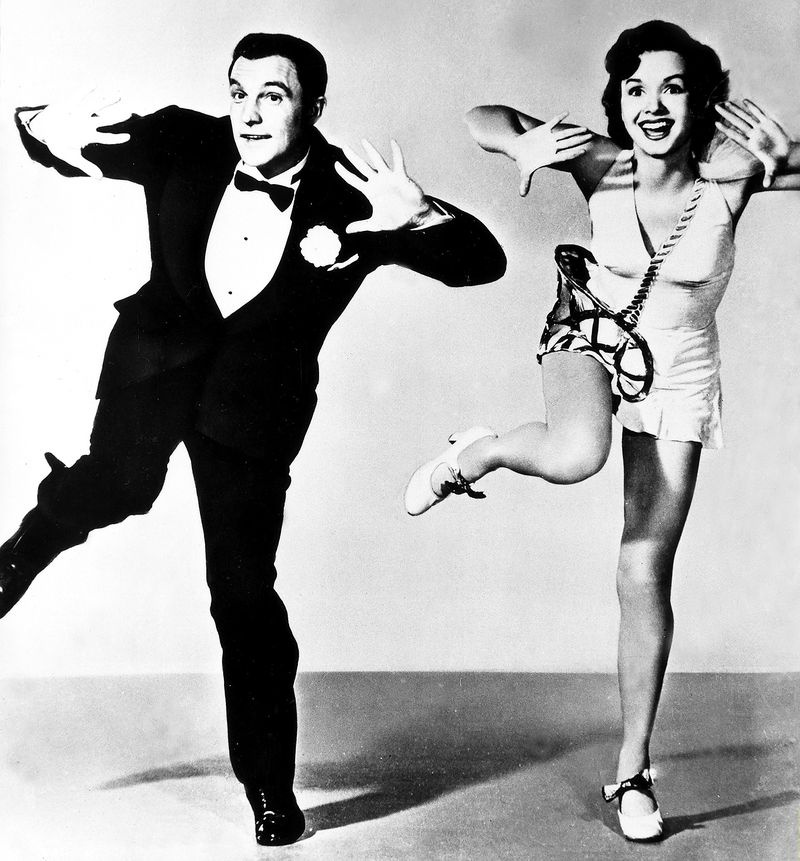 Gene Kelly og Debbie Reynolds ind